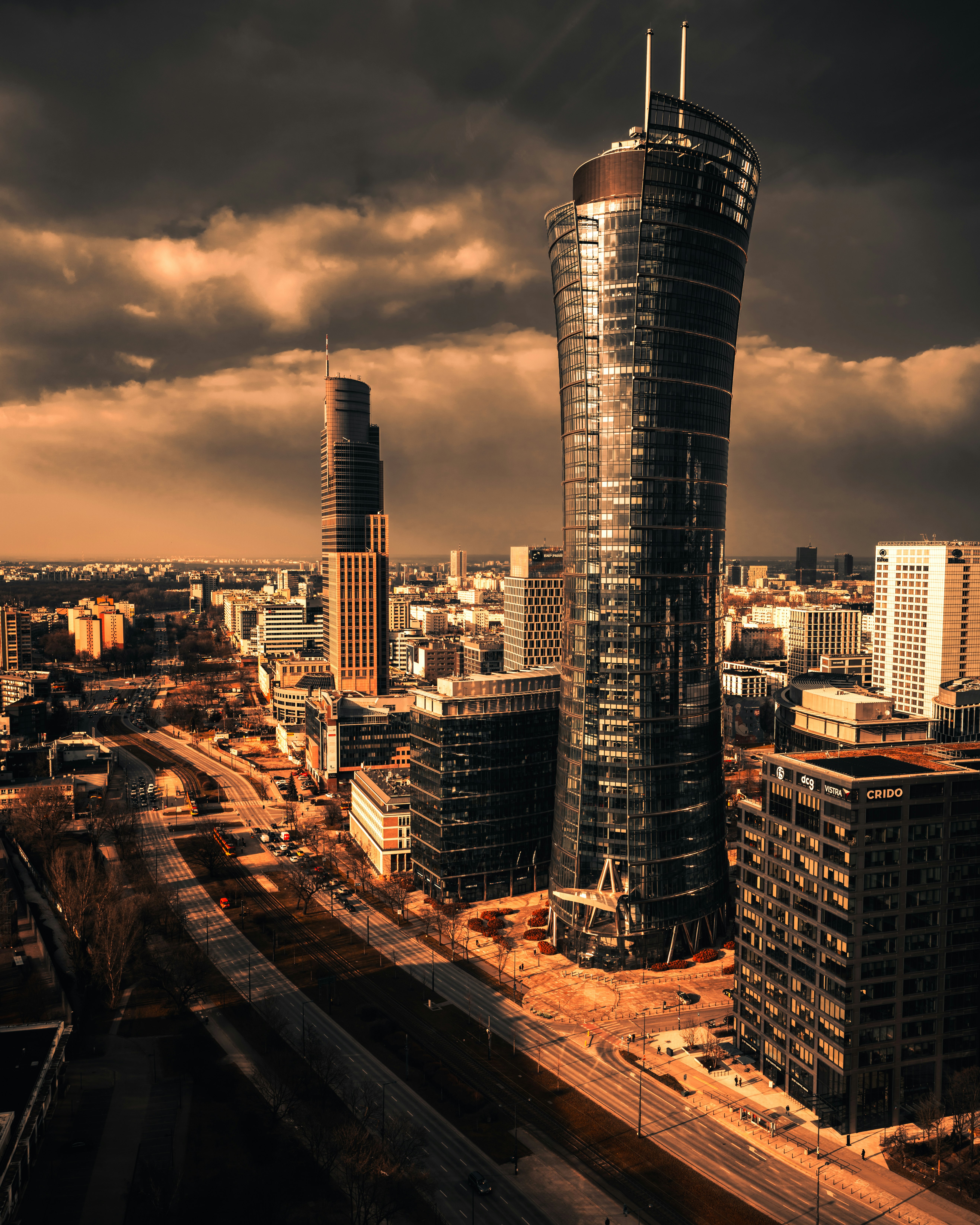 city skyline under gray cloudy sky during daytime